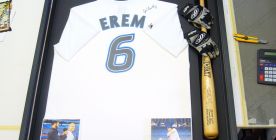 Blue Jays' jersey, gloves, and bat of Jose Bautista