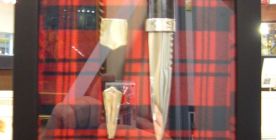 Knifes framed in a deep shadow box frame using customer's materials.